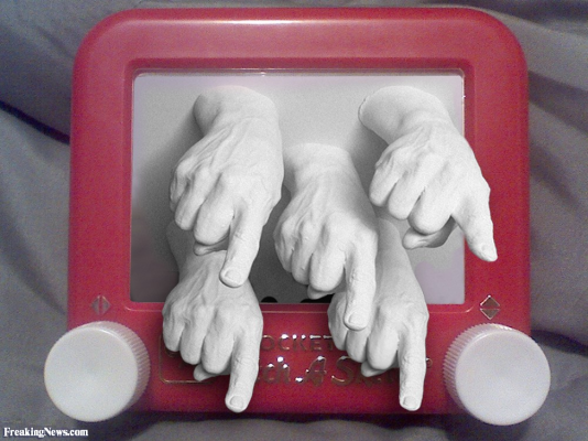 Hands-Coming-out-of-Etch-A-Sketch-87887.jpg