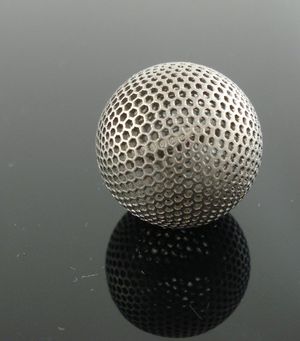 Titanium-3D-printing-by-imaterialise-Titanium-letter-ball.jpeg
